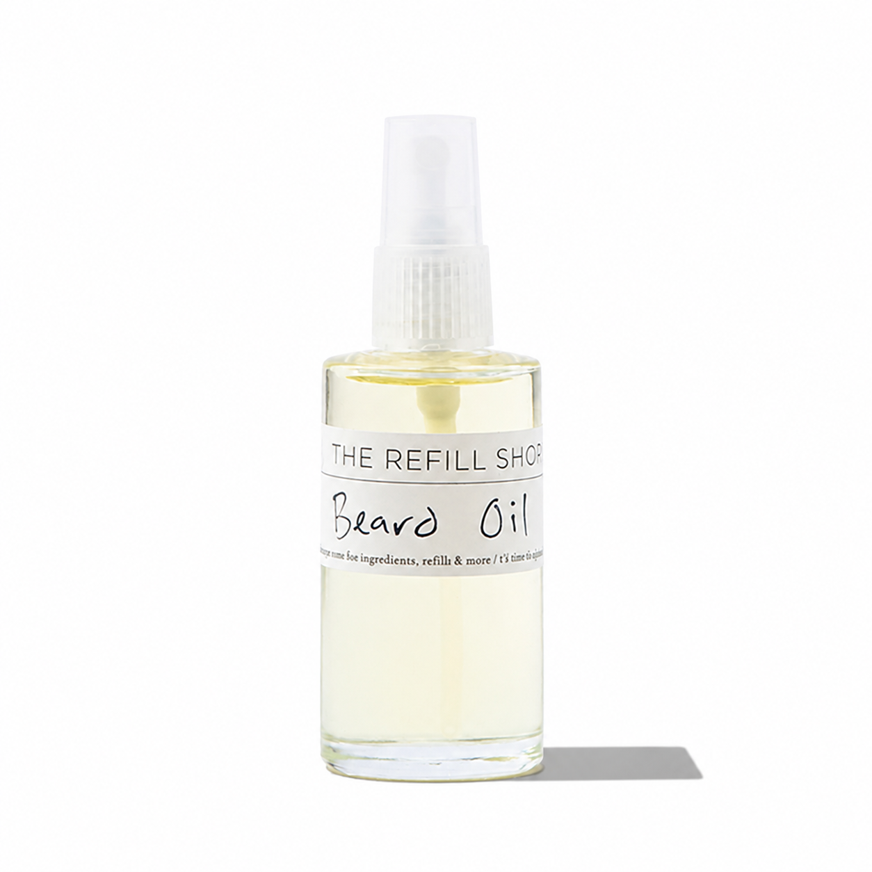 The Refill Shoppe beard oil in a glass bottle with a dropper, designed for nourishing and moisturizing men's facial hair.