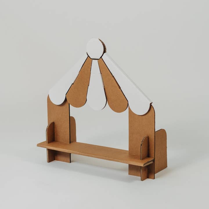Colorful Puppet Theatre Coucou by Papperlapapp with vibrant curtains and stage, designed for imaginative puppet shows.