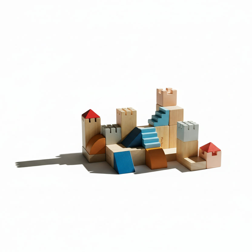 Colorful PlanToys Creative Play Blocks stacked and arranged for imaginative building and creative play.