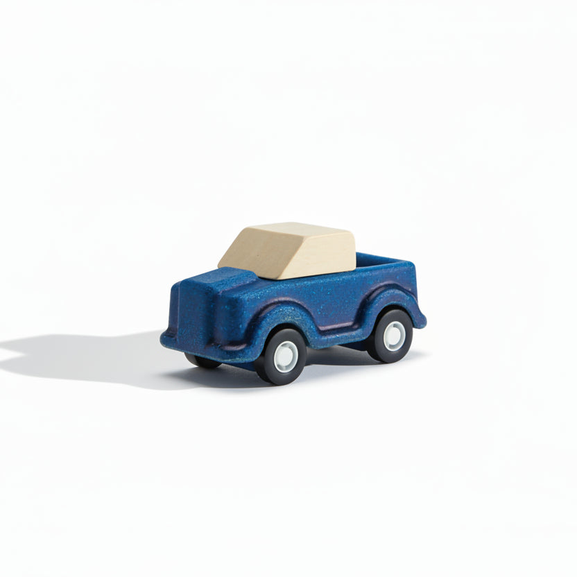PlanToys Truck Play toy set featuring colorful wooden trucks and accessories for imaginative truck play and creative fun.