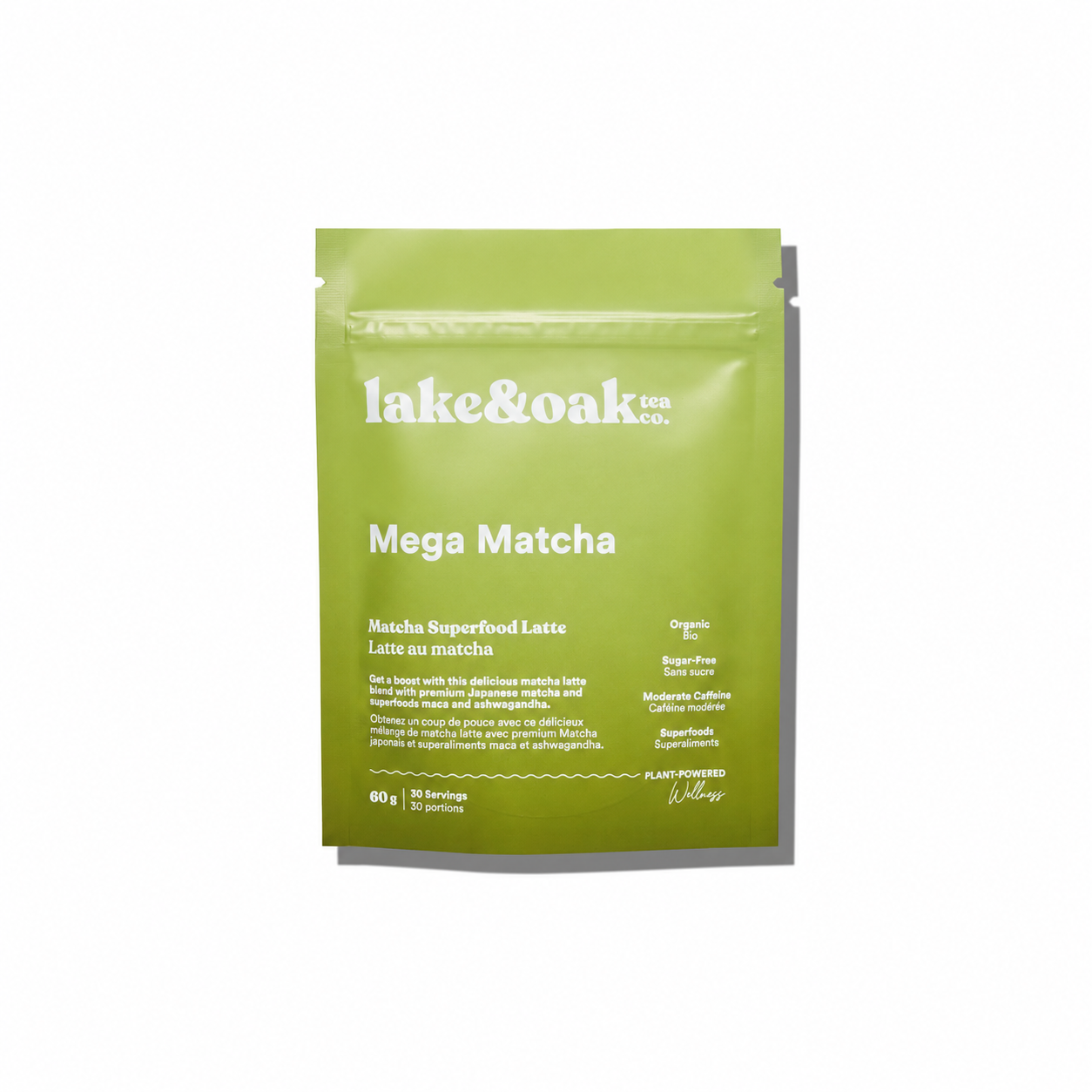 Bright green bowl of powdered Mega Matcha tea by Lake & Oak Tea Co. ready for whisking in traditional tea preparation.