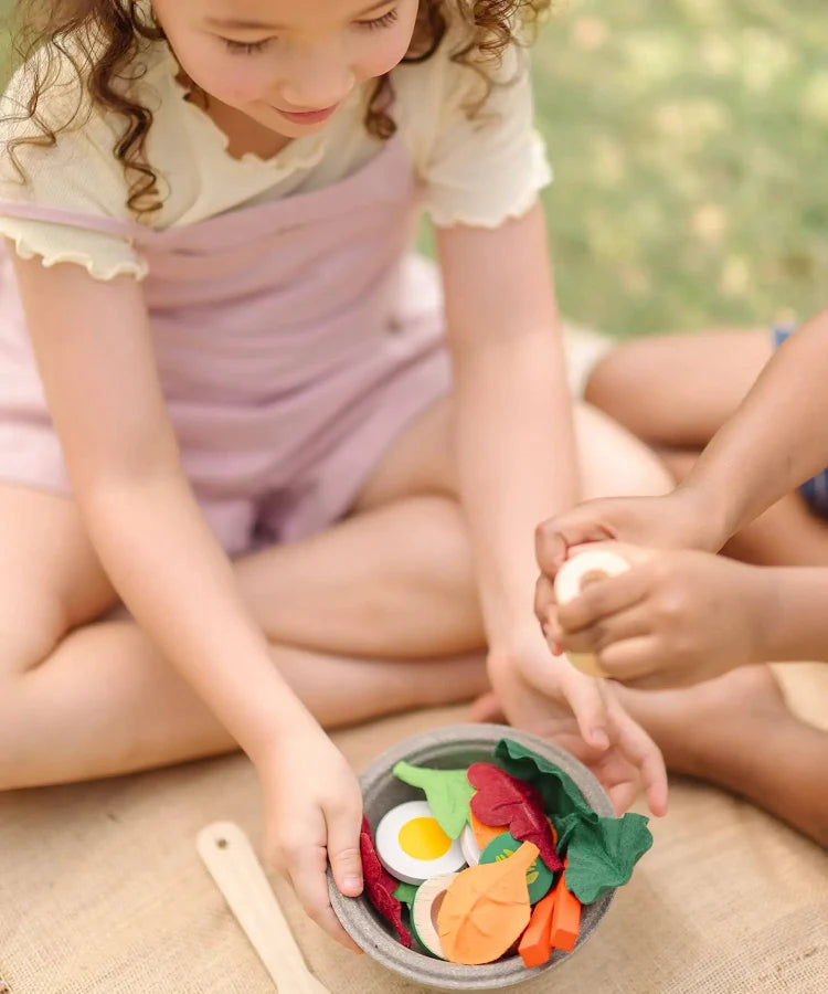 PlanToys Salad Set with realistic wooden vegetables and utensils for imaginative play and healthy meal role-playing.